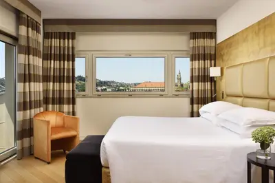 Letto o letti in una camera di FH55 Med Executive Hotel