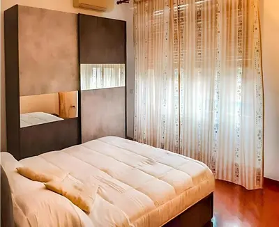 Letto o letti in una camera di Very nice terrazza de Medici Florenze Airport and parking free