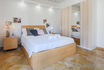 Letto o letti in una camera di Apartments Florence - Rosselli 3bdr with balcony