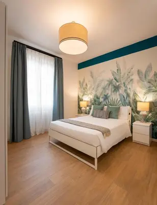 Letto o letti in una camera di Via Taddeo Alderotti, 85 - Elegant Apartment in Careggi, Near Hospital, University & Tram Morgagni - Florence Charming Apartments