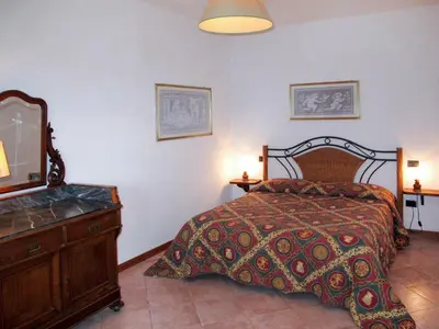 Letto o letti in una camera di Apartment Rondini by Interhome