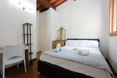 Letto o letti in una camera di Santa Croce Deluxe Suite