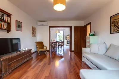 Area soggiorno di Malavolta Apartment by Mamo Florence