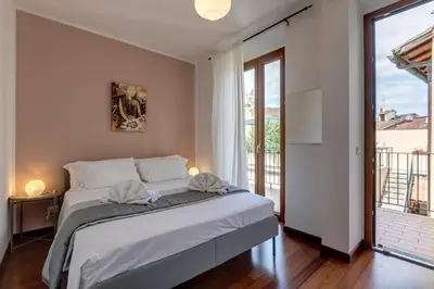 Letto o letti in una camera di Malavolta Apartment by Mamo Florence