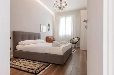 Letto o letti in una camera di Torrigiani Charming Apartment