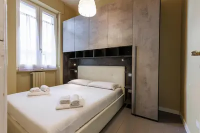 Letto o letti in una camera di Savonarola Comfort Apartment