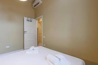Letto o letti in una camera di Savonarola Comfort Apartment