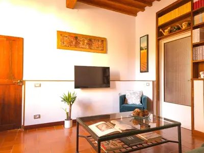 TV o dispositivi per l'intrattenimento presso La Fonderia Charme Oltrarno - Apartment with Private Patio