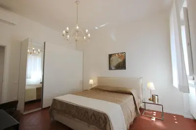 Letto o letti in una camera di Marsili Luxury Suite