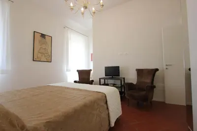 Letto o letti in una camera di Marsili Luxury Suite