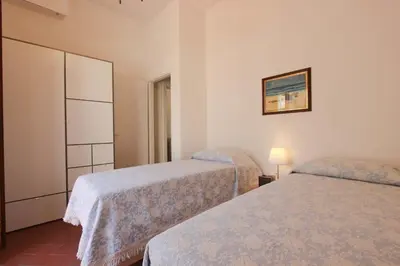 Letto o letti in una camera di Marsili Luxury Suite