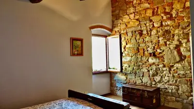 Letto o letti in una camera di La Speranza