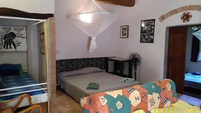 Letto o letti in una camera di La Speranza