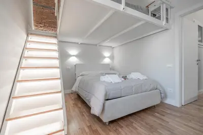 Letto o letti in una camera di CENTRO Da Vinci Loft