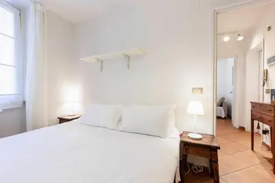 Letto o letti in una camera di Ponte Vecchio Comfort Apartment