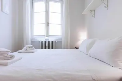 Letto o letti in una camera di Ponte Vecchio Comfort Apartment