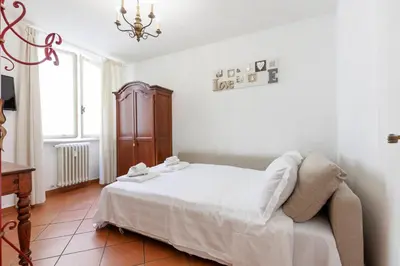 Letto o letti in una camera di Ponte Vecchio Comfort Apartment