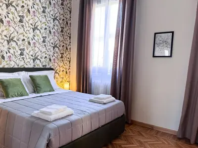 Letto o letti in una camera di Fiorentini - Stazione