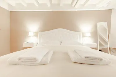 Letto o letti in una camera di Amazing apartment first floor Piazza Santa Croce Firenze