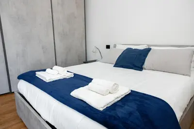 Letto o letti in una camera di Attico Giglio - Terrace near Florence & Tramvia