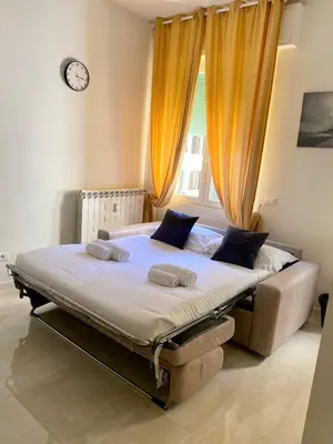 Letto o letti in una camera di NencioniHouse- Modern comfort close to city center