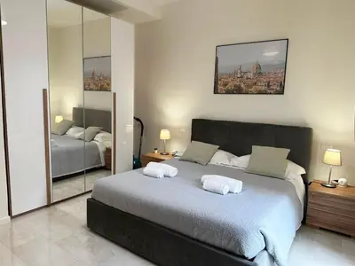 Letto o letti in una camera di NencioniHouse- Modern comfort close to city center