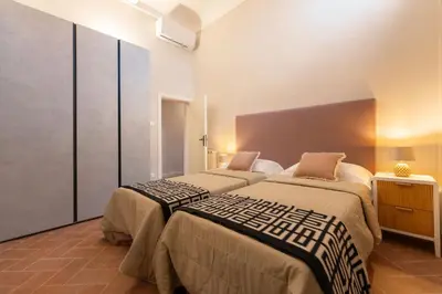 Letto o letti in una camera di Apartments Florence - Casa Pinocchio with view