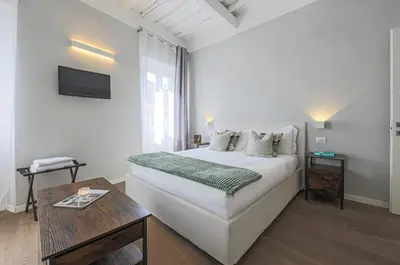 Letto o letti in una camera di Apartments Florence - Fiesolana's Flower with balcony