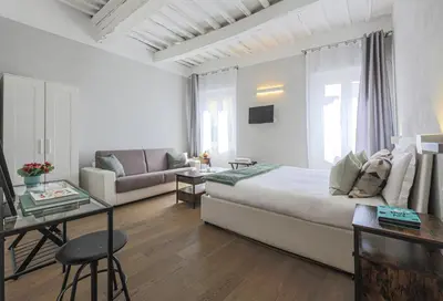 Letto o letti in una camera di Apartments Florence - Fiesolana's Flower with balcony