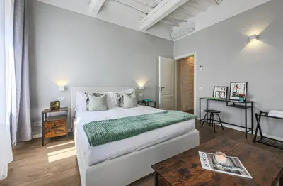 Letto o letti in una camera di Apartments Florence - Fiesolana's Flower with balcony