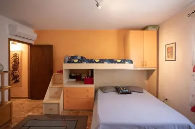 Letto o letti in una camera di Casa di Simone