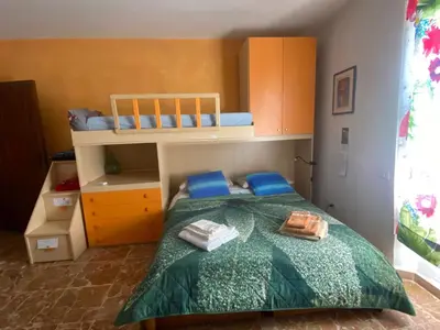 Letto o letti in una camera di Casa di Simone
