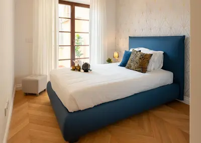 Letto o letti in una camera di Apartments Florence - Modern Florentine Terrace few steps from Duomo