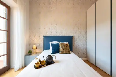 Letto o letti in una camera di Apartments Florence - Modern Florentine Terrace few steps from Duomo
