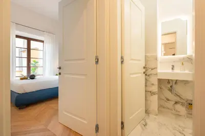 Letto o letti in una camera di Apartments Florence - Modern Florentine Terrace few steps from Duomo