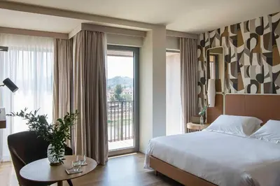 Letto o letti in una camera di Columbus Urban Resort