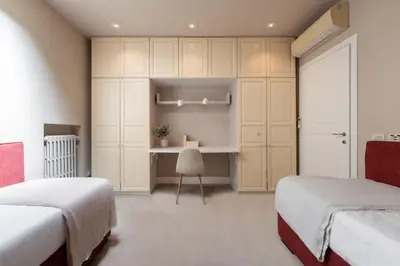 Letto o letti in una camera di Via del Campuccio, 72 - 300 sqm Luxurious with Parking and Private Terrace - Florence Charming Apartments
