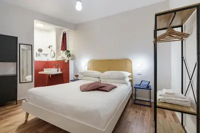 Letto o letti in una camera di Casa Vì - Milù Holidays Firenze