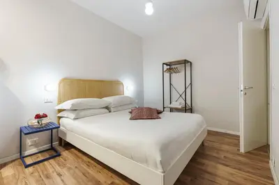 Letto o letti in una camera di Casa Vì - Milù Holidays Firenze