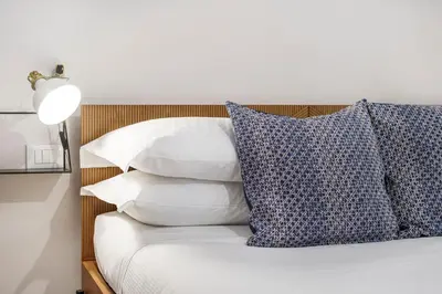 Letto o letti in una camera di Casa Vì - Milù Holidays Firenze