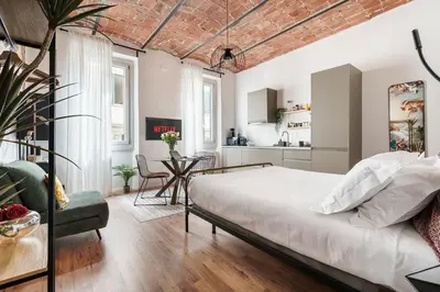Letto o letti in una camera di Casa Lù - Milù Holidays Firenze
