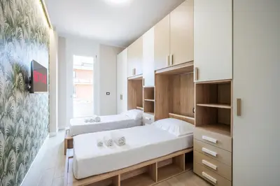 Letto o letti in una camera di 5 Minuti Stazione Luxury Firenze - Modern & Stylish Apartment