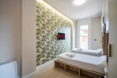 Letto o letti in una camera di 5 Minuti Stazione Luxury Firenze - Modern & Stylish Apartment