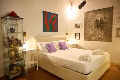 Letto o letti in una camera di Seipuntozero Art Factory Oltrarno