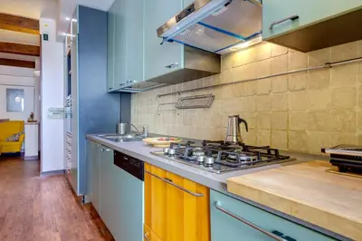 Cucina o angolo cottura di Dimora Ognissanti Apartment by Mamo Florence