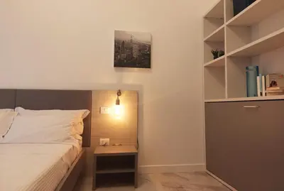 Letto o letti in una camera di City Apartment - Il Ghiro