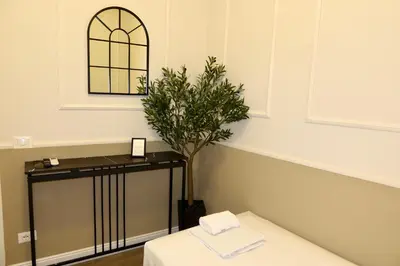 Letto o letti in una camera di El Roy Garden Rooms