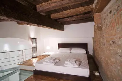 Letto o letti in una camera di Loft Pandolfini