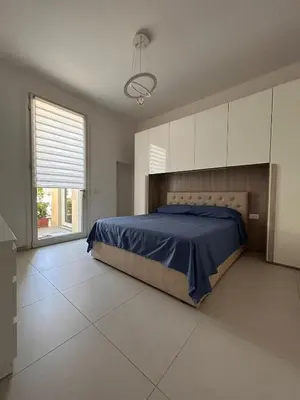Letto o letti in una camera di Nuovo appartamento
