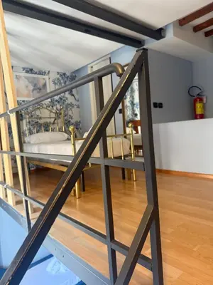 Letto o letti in una camera di Da Vinci Living Apartment a 10 minuti a piedi dal David